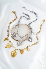 Sacred hearts gold and silver charm necklace: Yellow Gold - Cie Cie + Co