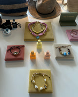 Scallop shell bracelets with wooden beads: Blue scallop - Cie Cie + Co