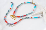 Fish beaded necklace in Greek islands colors: Gold - Cie Cie + Co