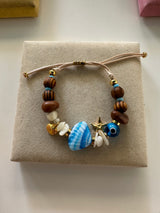 Scallop shell bracelets with wooden beads: Blue scallop - Cie Cie + Co