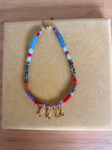 Fish beaded necklace in Greek islands colors: Gold