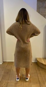 Brown knitted roll neck oversized midi long sleeve dress on its own back