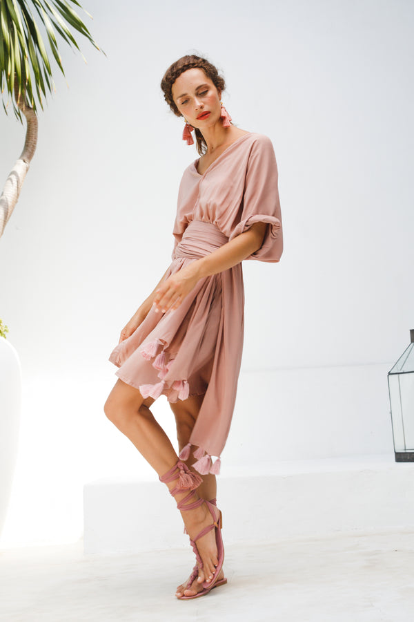 Deep v-neck short dress in Dusty Rose side wide campaign