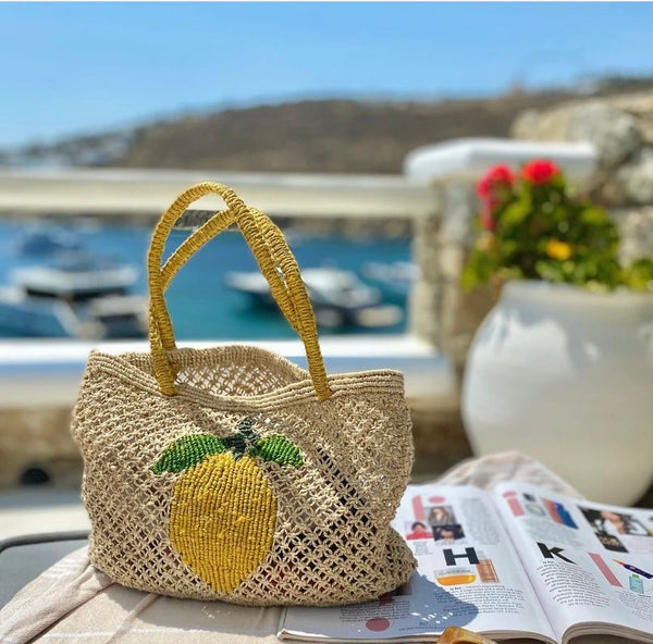 Shoppers jute bag with lemon motif lifestyle