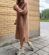 Brown knitted roll neck oversized midi long sleeve dress side with sneakers