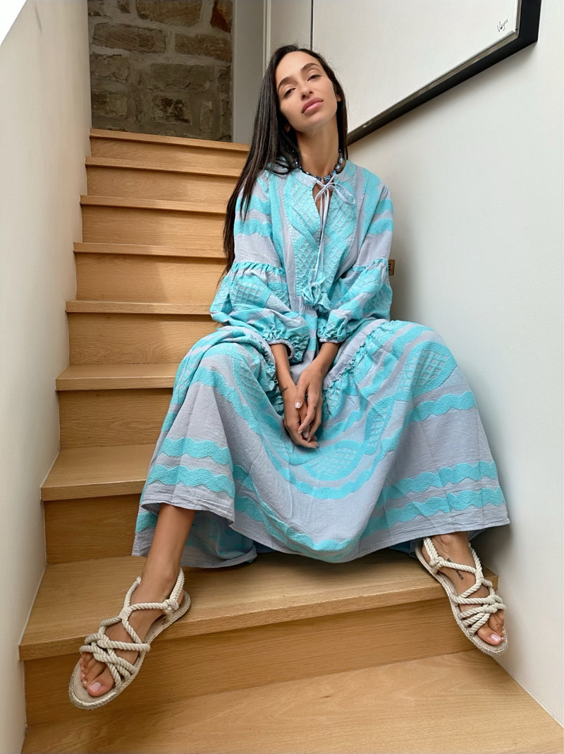 100% cotton long sleeve maxi dress in aqua model seated 2