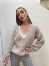 Beige Mohair Cardigan with mother of pearl buttons styled with pants front close